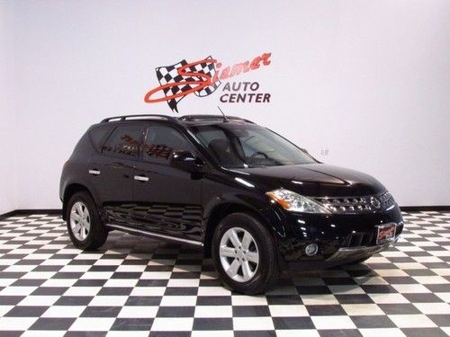 Navigation, sunroof, heated leather, awd