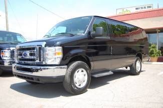 Very nice 2012 model black ford 10 or 13 pass. van with entertainment system!