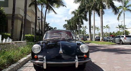 1964 porsche 356 c. black with red. restored car in excellent condition.