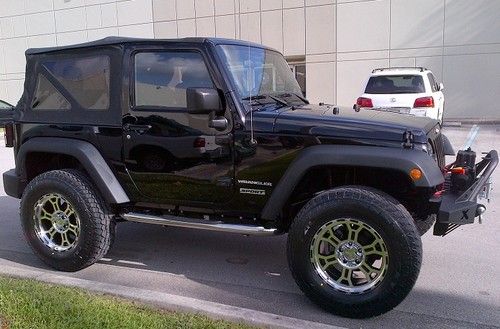 2011 wrangler sport black ,trail ready ,over size tires !