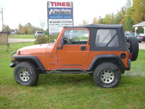 2001 jeep wrangle, 6cyl, dana 44, 5spd, soft and hard tops, lots new parts