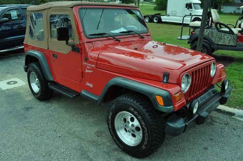 '99 jeep wrangler, v6, manual, red, very clean, new goodyear tires, new top!!!