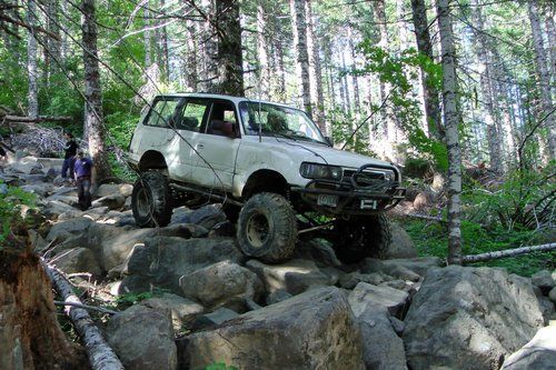 Rock crawler 1991 lifted fj80 toyota land cruiser white with lots of upgrades