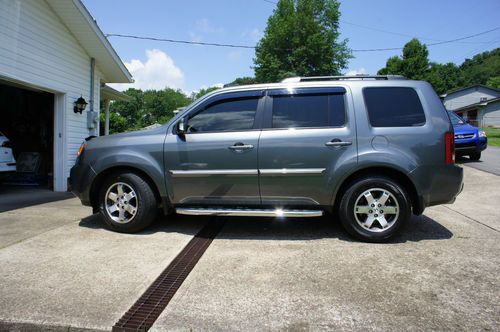 Honda pilot touring 2010 with nav/res 4wd