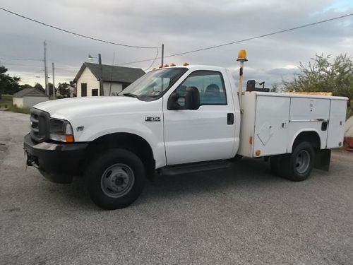 Ford f-350 4x4 dually with a 9&#039; reading utility body and liftgate