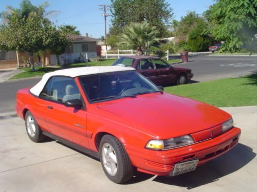1993 pontiac sunbird se convertable, red with white top, california car