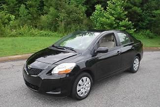 2010 toyota yaris black 4 door automatic, air cond 41k miles warranty no reserve