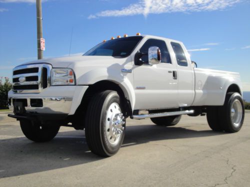 2005 f450 ext cab 4x4 long bed on 24.5 in semi alcoas, mods, 30,000 lbs towing