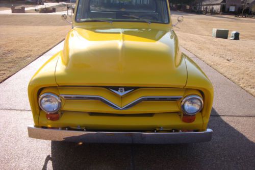 Fully restored, bright yellow pickup