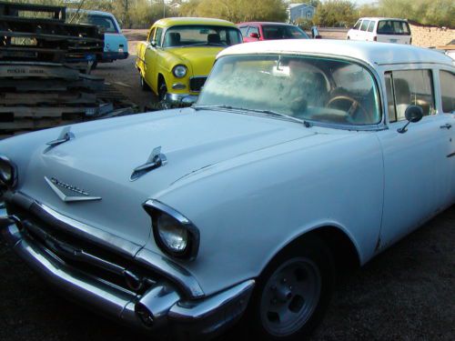 1957 chevy 2 dr 150 model v-8 4 speed runs and drives needs to be done