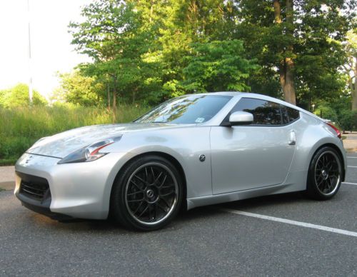 370z with aftermarket tires, wheels, cold air induction, exhaust and stereo