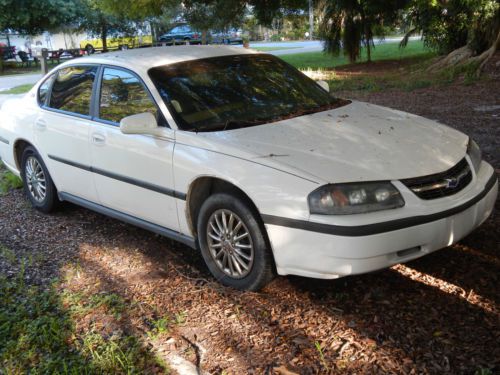 2002 silver chevy impala ls 3800 v-6 blown head gasket