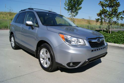 2014 subaru forester 2.5i touring. 7,855 miles. eye sight system. navigation new