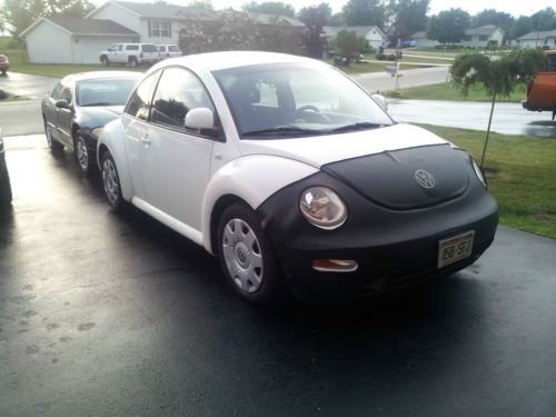 White, black cloth interior. automatic. 105,000 miles. new tires. runs great.