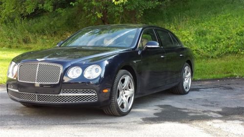 Dark sapphire blue mulliner loaded was $249k msrp