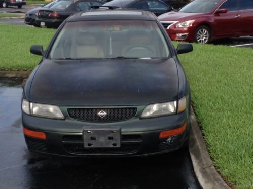 Nissan maxima dark green