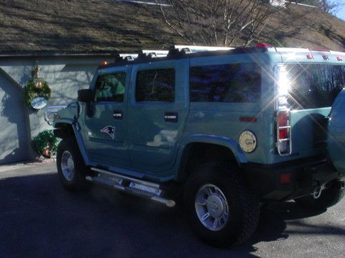 2007 hummer h1 fully loaded 4 tv's moon roof 3rd row laptop on board nav etc
