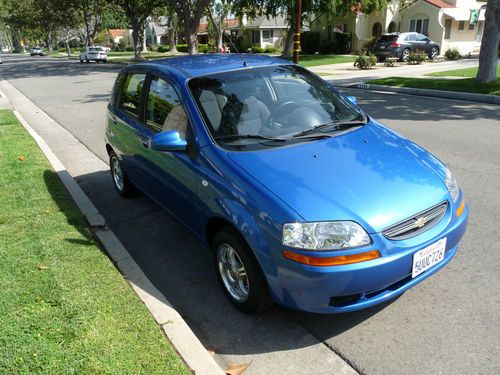 2006 chevrolet aveo special value hatchback 4-door 1.6l with only 8,773 miles!