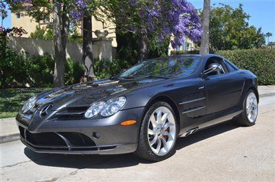 2006 mercedes-benz slr mclaren. 13k miles. silver over black. big window sticker