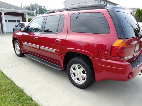 Gmc envoy 4x4 slt third row seating