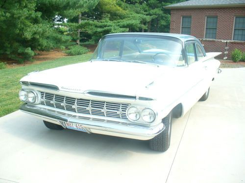 1959 chevy biscayne, white 2 door stright 6 cylinder 235 cid 145 hp all original