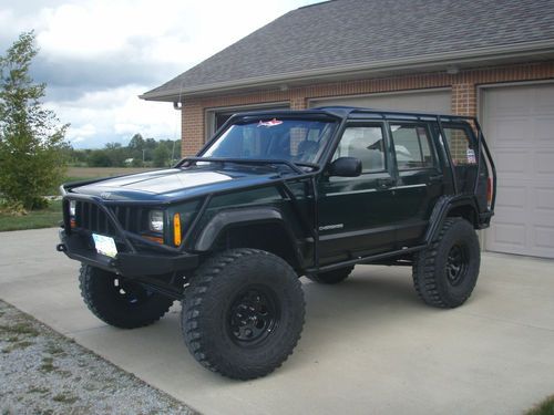 1999 jeep cherokee  4-door 4.0l   lifted,  arb lockers,  roll cage