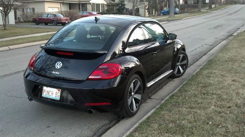 2.0t turbo coupe 2.0l 6 disc cd deep black metalic-touch screen-loaded w/options