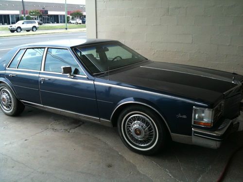 1984 cadillac seville, dark blue, 6k miles on rebuilt motor, runs great!