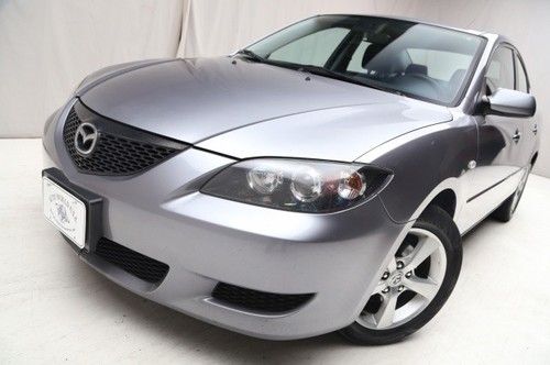 We finance! 2006 mazda mazda3 i touring fwd 5 speed