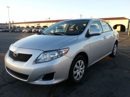 2010 toyota corolla le sedan 4-door 1.8l 21,827 mileage