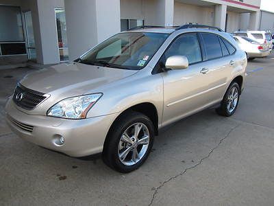 06 awd suv leather tan sunroof navigation clean carfax heated seats cd/cass