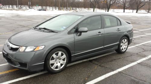 2010 honda civic lx 1.8l 4-door_warranty included_leather_spoiler_no reserve