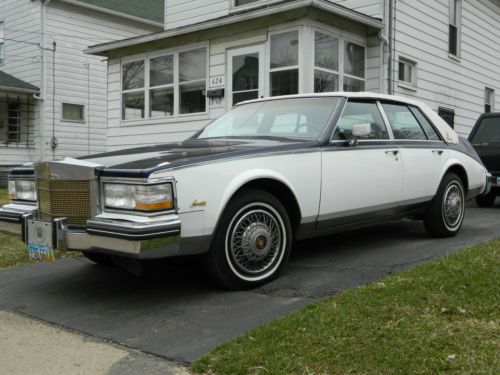*beautiful 1985 cadillac seville pearl white candy blue euro*