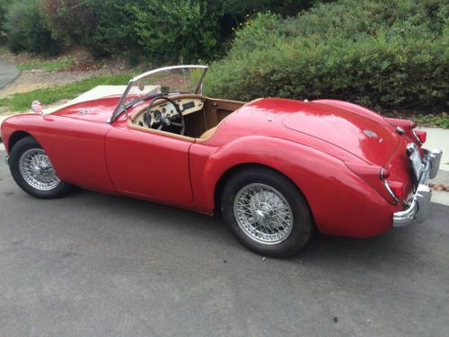 Red 1597 mga, 2 door sports car with newly rebuilt engine