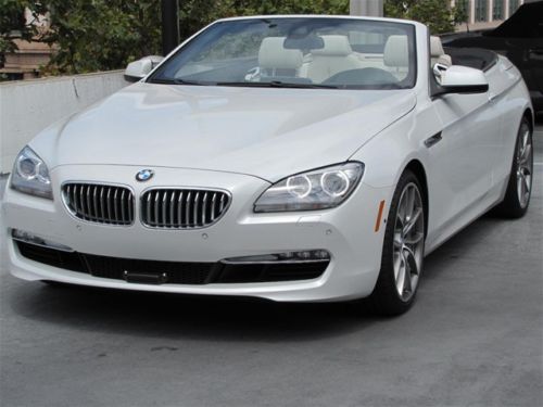 Convertible  in mineral white with 4500 miles!