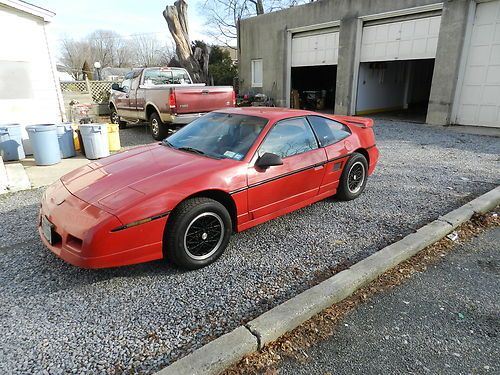 1988 red pontiac fiero gt