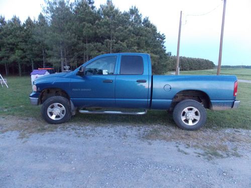 2003 blue dodge ram 2500 4x4 4-door diesel truck