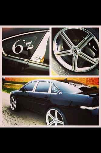 Black 2007 chevrolet impala on 26" irocs