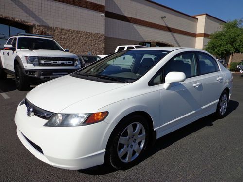 2006 honda civic lx sedan with leather interior. only 18k miles. no fees!