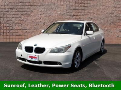 We finance!!! 525i 3.0l white w/ tan leather sunroof moonroof