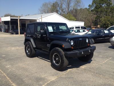 Custom wrangler, tires and wheels, kicker system, neon lights, superchip