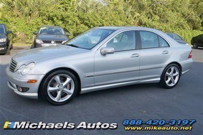 Sport sedan. silver on ash lther. sunroof. hk sound. low miles. financing avail.