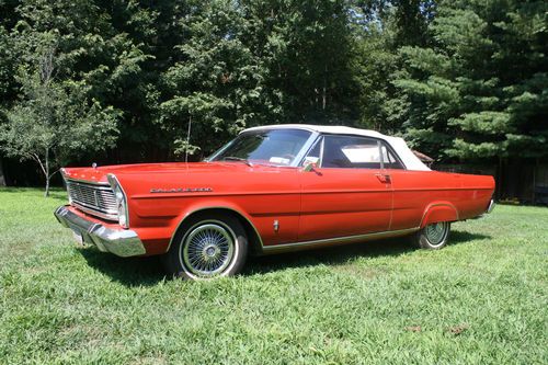 1965 ford galaxie convertible.red body/white roof,390 hp. clean. good conditions
