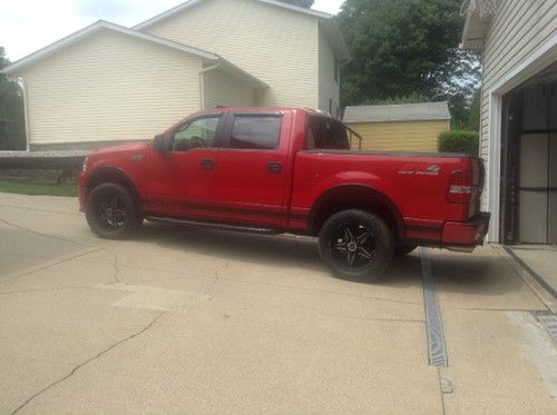 Roush ford f150 four wheel drive quad crew cab loaded.