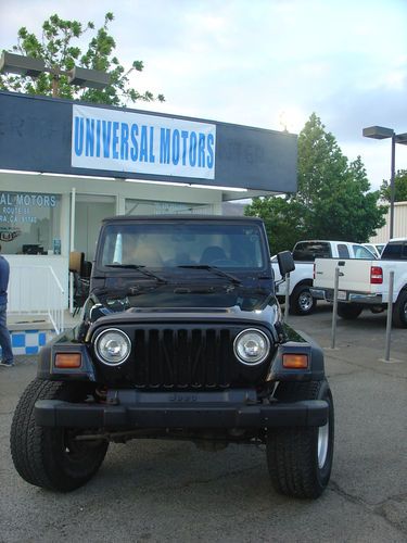 1999 jeep wrangler 4x4 lifted of -road tires. 5 speed manual clean titel $$$