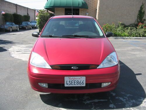 2001 Ford Focus ZX3 Coupe with manual transmission, Great Condition, NO RESERVE, image 2