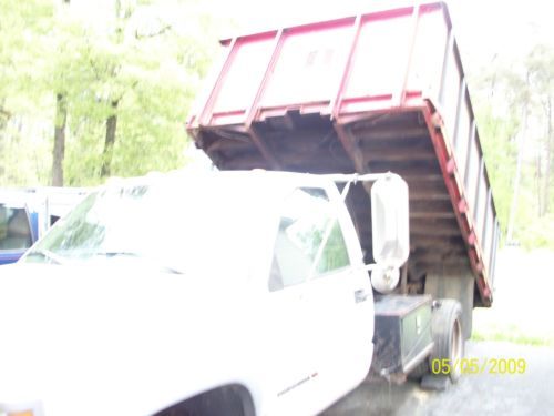 Hd steel frame dump bed, hydrulic lift in cab pto control.