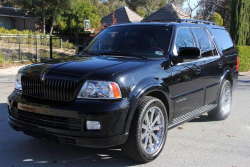 2005 lincoln navigator base sport utility 4-door 5.4l triple black custom 8 seat