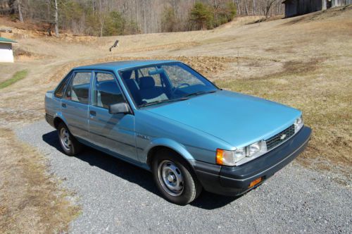 Chevy Nova,  4 cylinder  Automatic, 4 door sedan, runs good  56,858 actual miles, image 2