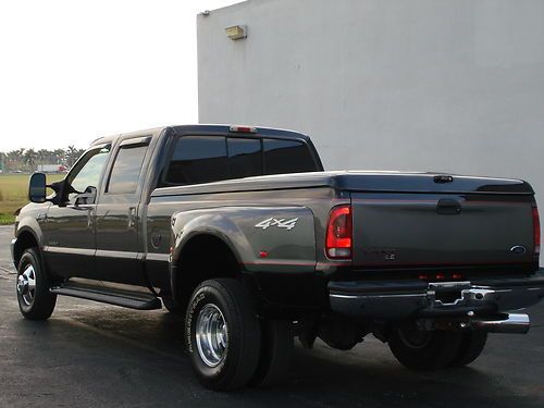 2003 ford f350 lariat le superduty 4x4 7.3 diesel crew cab 21,200 miles clean!!